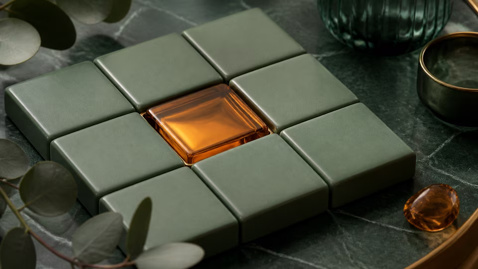 Blank green ceramic tiles aligned with an amber glass tile